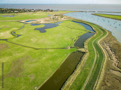 Aerial view of the salt marshes and coastal river in the famous coastal town of Aldeburgh in Suffolk, England. photo