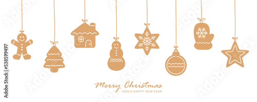 christmas card with hanging gingerbread cookies decoration on blue background