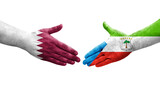 Handshake between Equatorial Guinea and Qatar flags painted on hands, isolated transparent image.