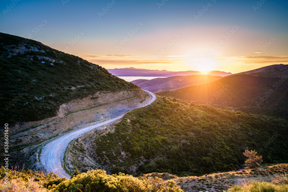 Beautiful rural landscape in Euboea (Evia) island in Greece, during afternoon, following the road from Chalkida to Karystos. Beautiful rural landscape in Euboea (Evia) island in Greece, during afternoon, following the road from Chalkida to Karystos.