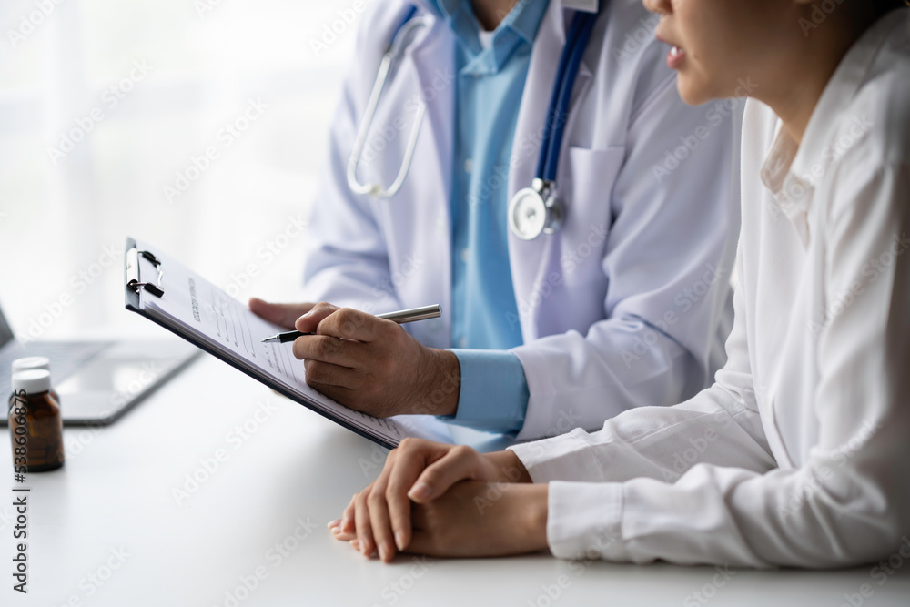Doctors have conversations with patients while discussing and explaining symptoms or counseling diagnosis health and consult treatment of disease, healthcare, and assistance concept. Doctors have conversations with patients while discussing and explaining symptoms or counseling diagnosis health and consult treatment of disease, healthcare, and assistance concept.