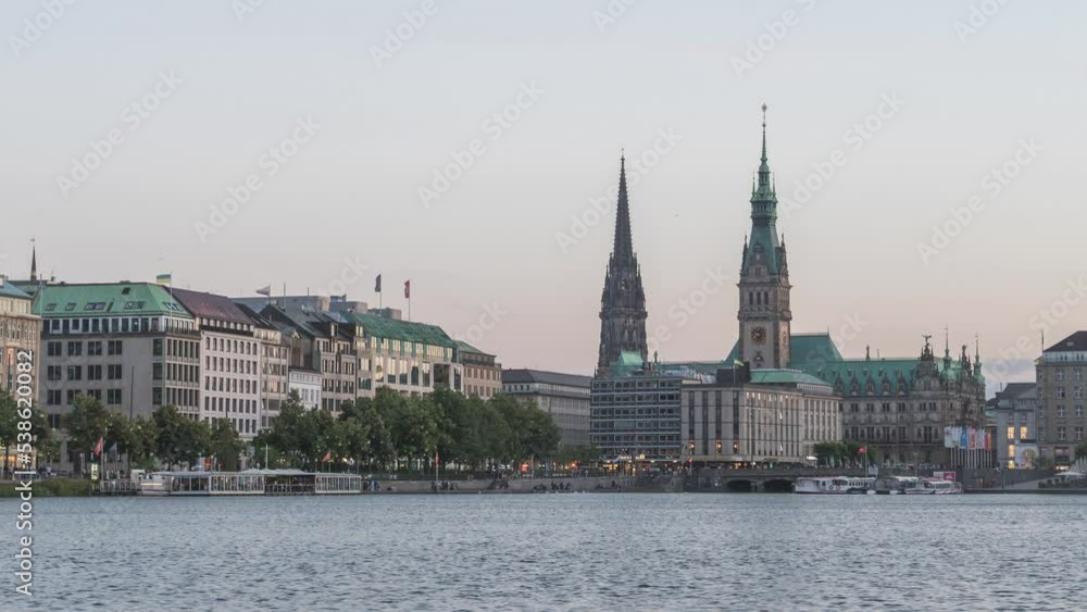 Hamburg Germany time lapse 4K, city skyline day to night timelapse at Alster Lake with Fountain Hamburg Germany time lapse 4K, city skyline day to night timelapse at Alster Lake with Fountain