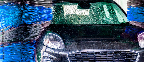 Photography A vehicle in an automatic car wash