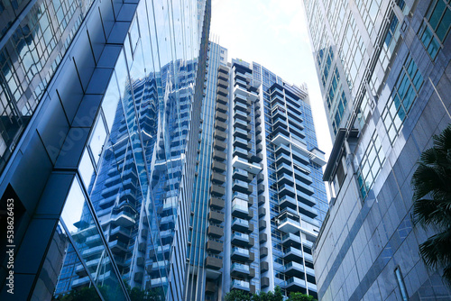 Photography low angle view of singapore city buildings.