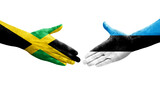 Handshake between Estonia and Jamaica flags painted on hands, isolated transparent image.