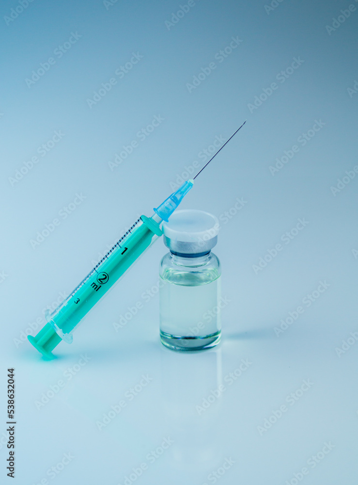 syringe with needle and vial with steroids. illegal doping in sport concept syringe with needle and vial with steroids. illegal doping in sport concept