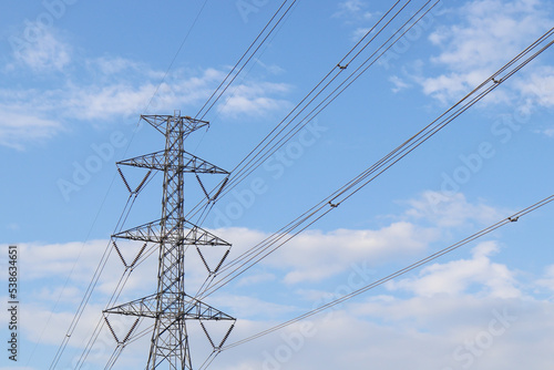 landscape of electric tower with blue sky background, copy space 