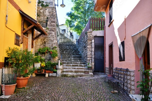 Bilde på lerret A narrow street between the old stone houses of Frosolone, a medieval village in the Molise region of Italy