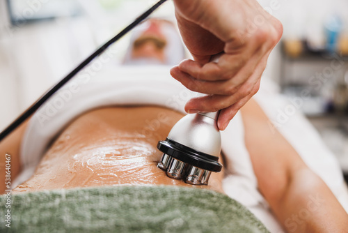 Фотография Woman Enjoying Anti Cellulite RF Lifting Treatment