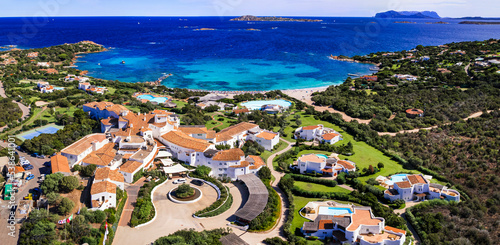 Fototapeta Naklejka Na Ścianę i Meble -  Italy summer holidyas . Sardegna island - stunning Emerald coast with  beautiful beaches. aerial view of Romazzino beach