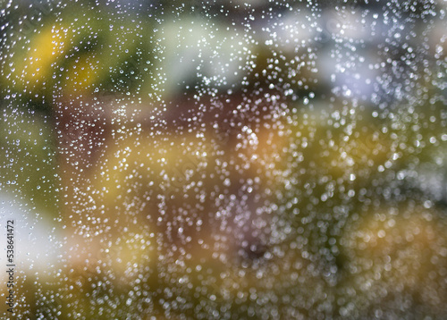 Rain water drops on a glass surface background, Abstract Backdrop