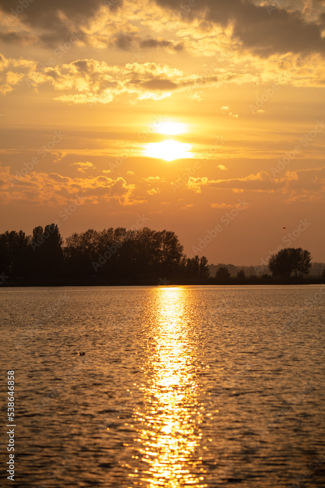 Golden sunset on the lake. Golden sunset on the lake.