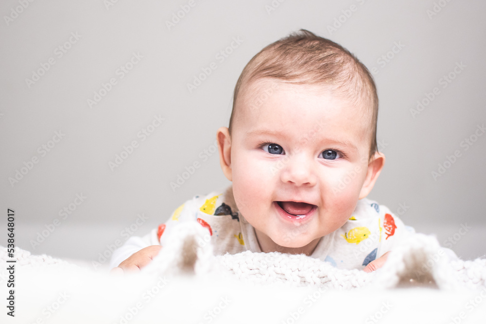 baby in prone position happy smiling Stock Photo Adobe Stock