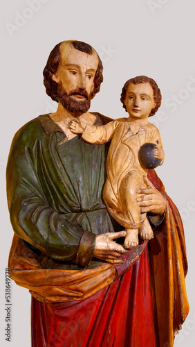 St.Joseph Statue image with baby jesus Joseph was a 1st-century Jewish man who married to Mary, the mother of Jesus photo
