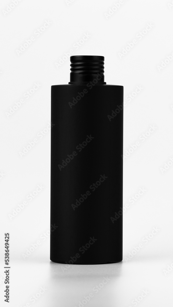 Unbranded black plastic flacon for cosmetics products vertical mockup. Skincare and cosmetology branding identity template for text and design