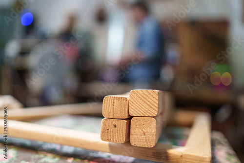 wood laths in carpentry - focus on the subject and blurred background © Lomb