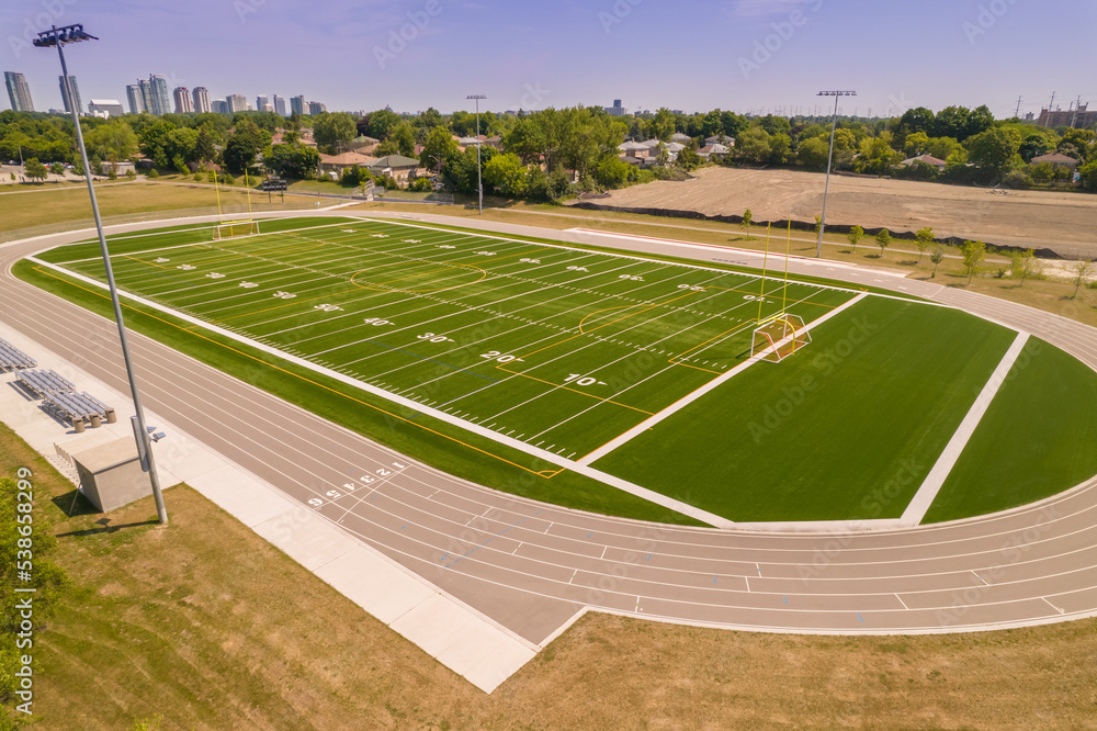 Soccer field grass view. Football field with green grass and white