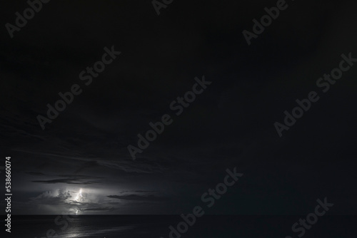 Nightshot: flashes of lightning in thunderstorm scenery around Curacao, the Caribbean