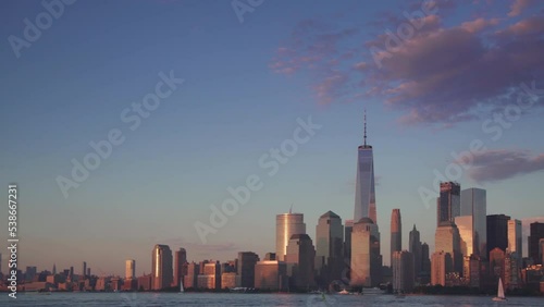 Pan across New York city to Lower Manhattan with downtown skyline