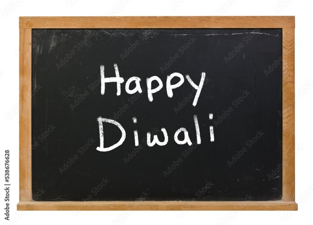Happy Diwali Festival of Lights written in white chalk on a black chalkboard isolated on white Happy Diwali Festival of Lights written in white chalk on a black chalkboard isolated on white