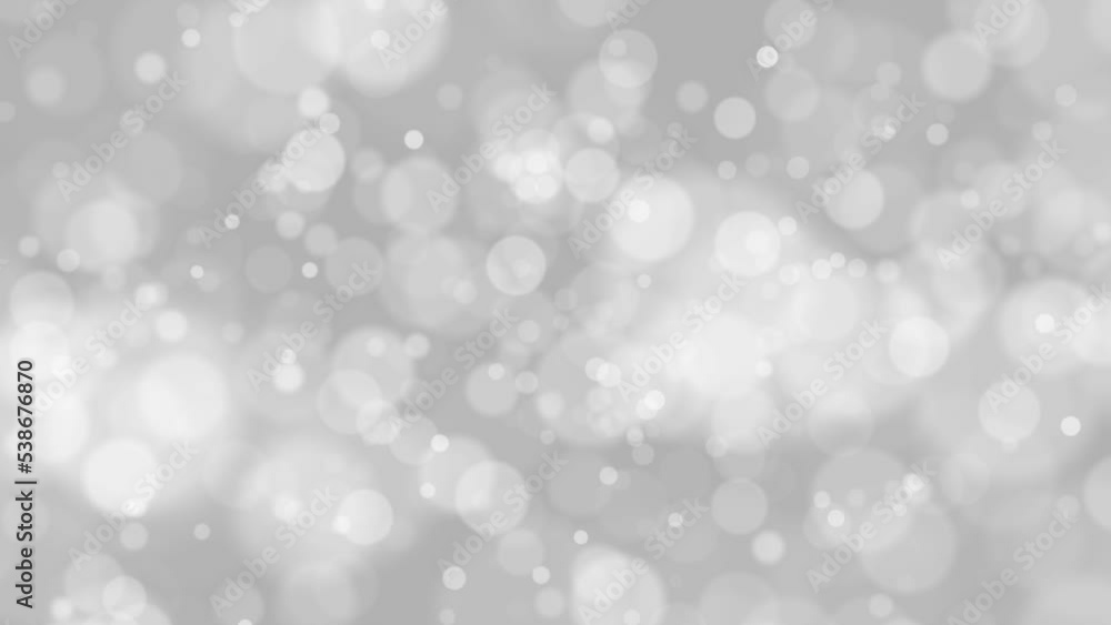 Silver white blurred concept Christmas and New year circle bokeh motion copy space animation background. Silver white blurred concept Christmas and New year circle bokeh motion copy space animation background.