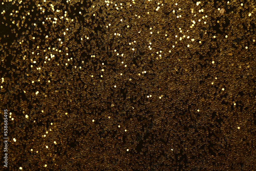 Gold (bronze) glitter shine dots confetti on black. Abstract light blink sparkle backgound. Gold (bronze) glitter shine dots confetti on black. Abstract light blink sparkle backgound.
