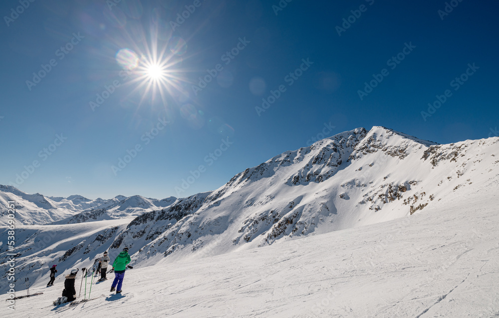 Winter panorama of Bansko, Bulgaria during ski season with people