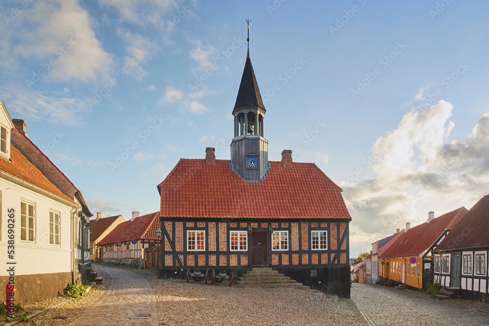 Ebeltoft, Denmark, September, 2022: Ancient chapel on a cozy street at sunset Ebeltoft, Denmark, September, 2022: Ancient chapel on a cozy street at sunset