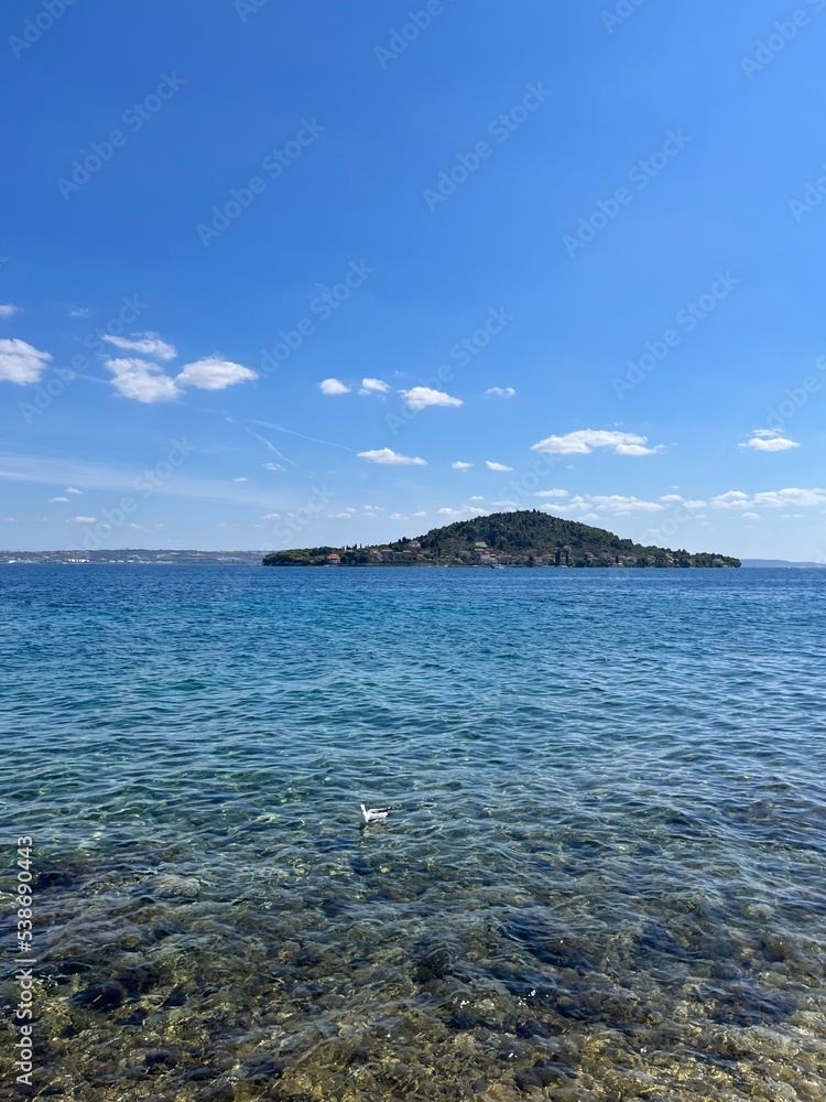 Blue sea horizon, blue sky, natural colors, pure sea water surface