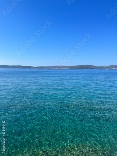 Blue sea horizon  blue sky  natural colors  pure sea water surface