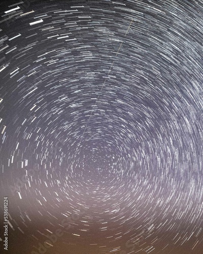 Wonderful milky way with million stars at night and startrails