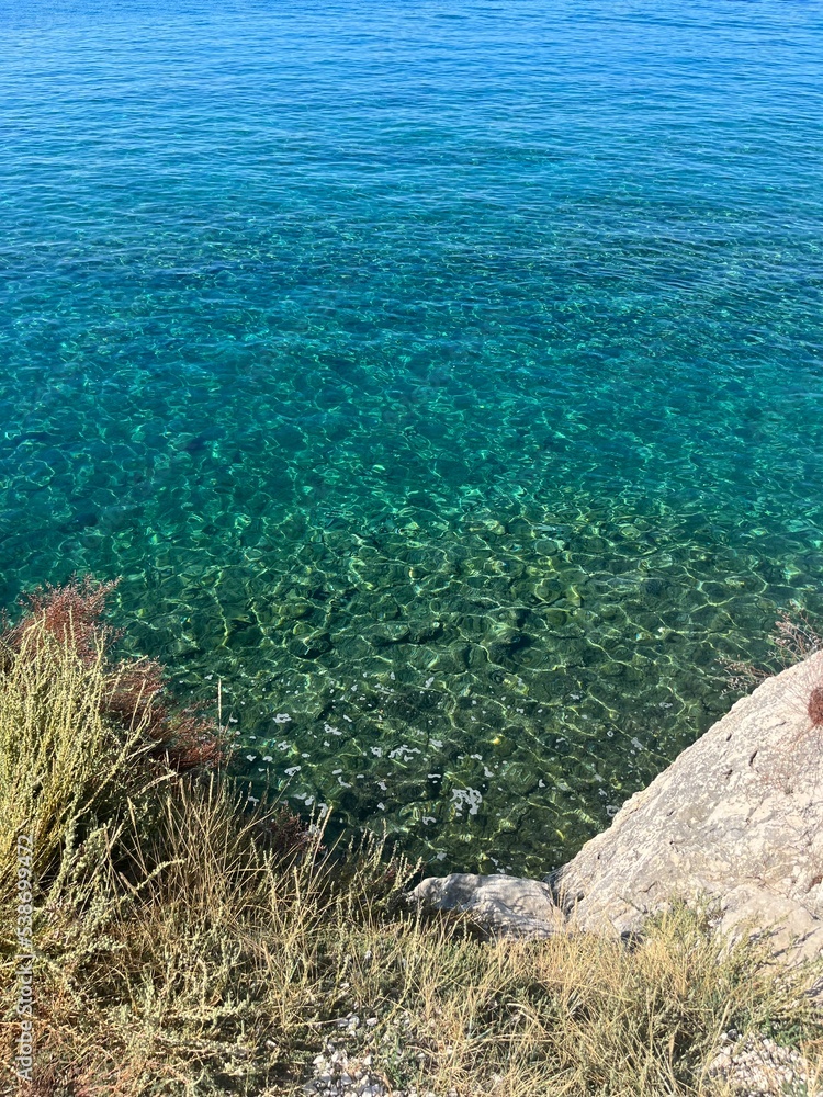 Azure sea water, view from the above, natural background Azure sea water, view from the above, natural background