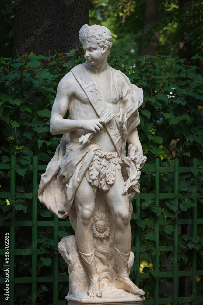 Marble statue of allegory of noon in Summer Garden, Saint Petersburg, Russia Marble statue of allegory of noon in Summer Garden, Saint Petersburg, Russia