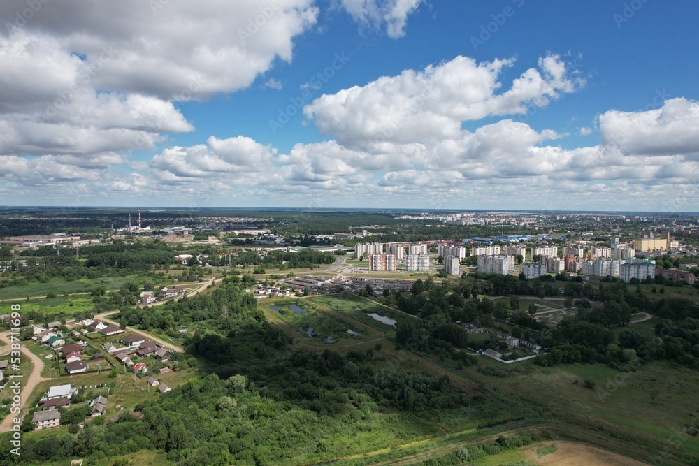 Aerial view of urban development from the side of the meadow. Suburb of Pinsk, Belarus.
