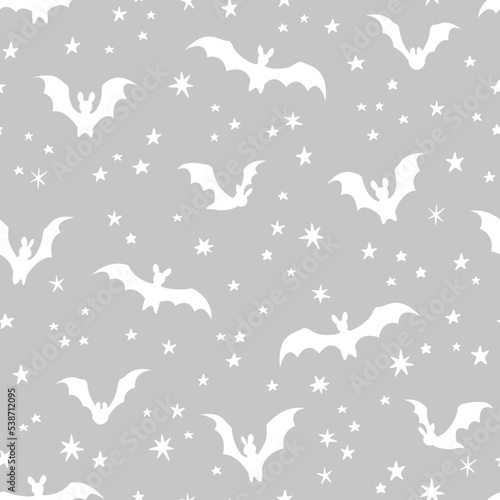 Vector seamless pattern with bats and stars. Halloween design for wrappings, textile, wallpaper and backgrounds.