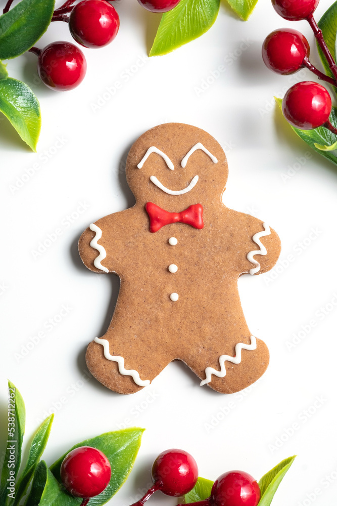 Cute Gingerbread man for Christmas card. Cozy concept of Christmas and winter holidays. Top view. Cute Gingerbread man for Christmas card. Cozy concept of Christmas and winter holidays. Top view.