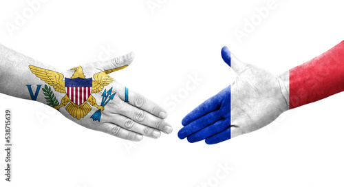 Handshake between France and Virgin Islands flags painted on hands  isolated transparent image.