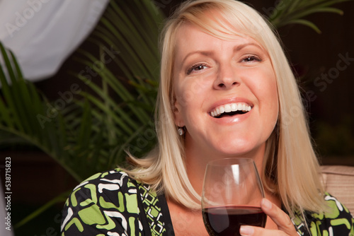 Smiling Blonde Woman Enjoyi...