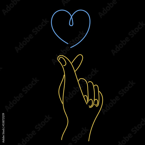 ПечатьSupport Ukraine, the hand shows the symbol of the heart, the colors of the Ukrainian flag. Donation and volunteering concept.