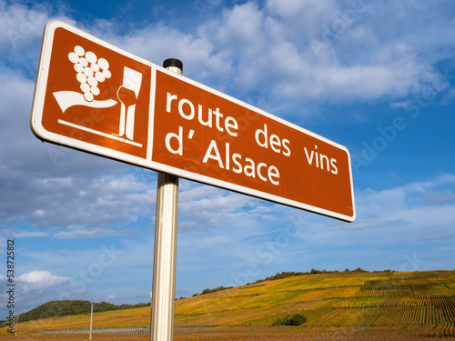 A sign and a symbol of Route des vins in Alsace, France. English translation: Wine route of Alsace photo