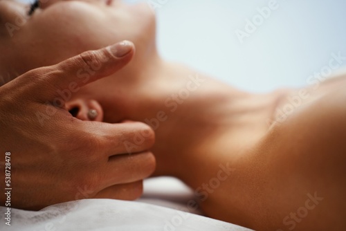 Wallpaper Mural Face massage. Young pretty woman having face massage in the salon Torontodigital.ca