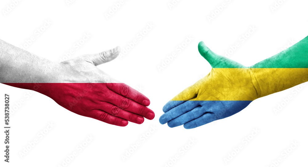 Handshake between Gabon and Poland flags painted on hands, isolated transparent image. Handshake between Gabon and Poland flags painted on hands, isolated transparent image.
