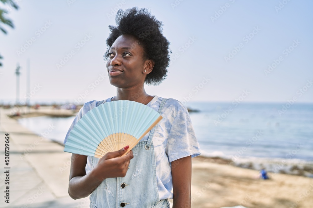 People Using Hand Fans Using Hand Fan