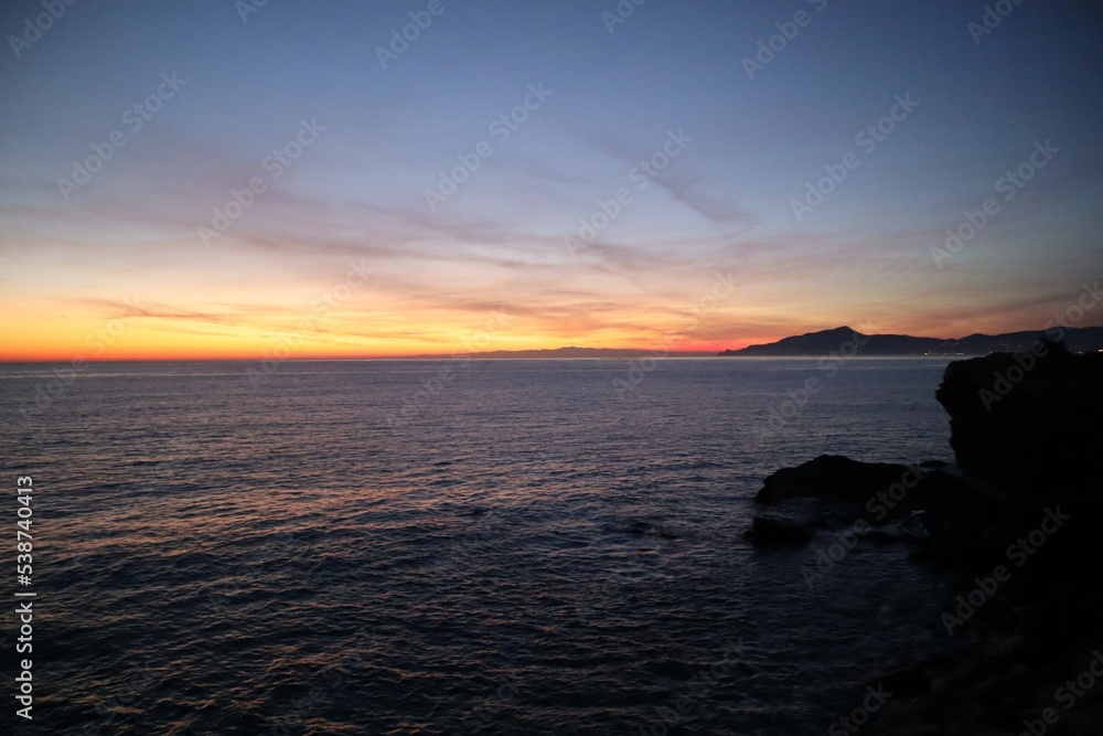 sunset over the sea sunset over the sea