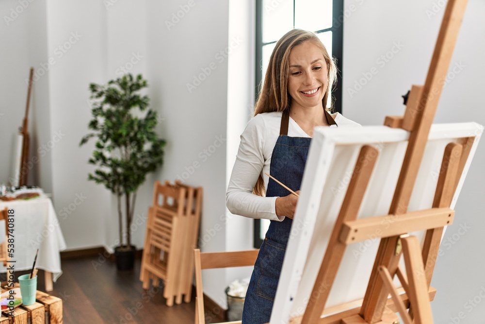 Young caucasian woman smiling confident drawing at art studio Young caucasian woman smiling confident drawing at art studio