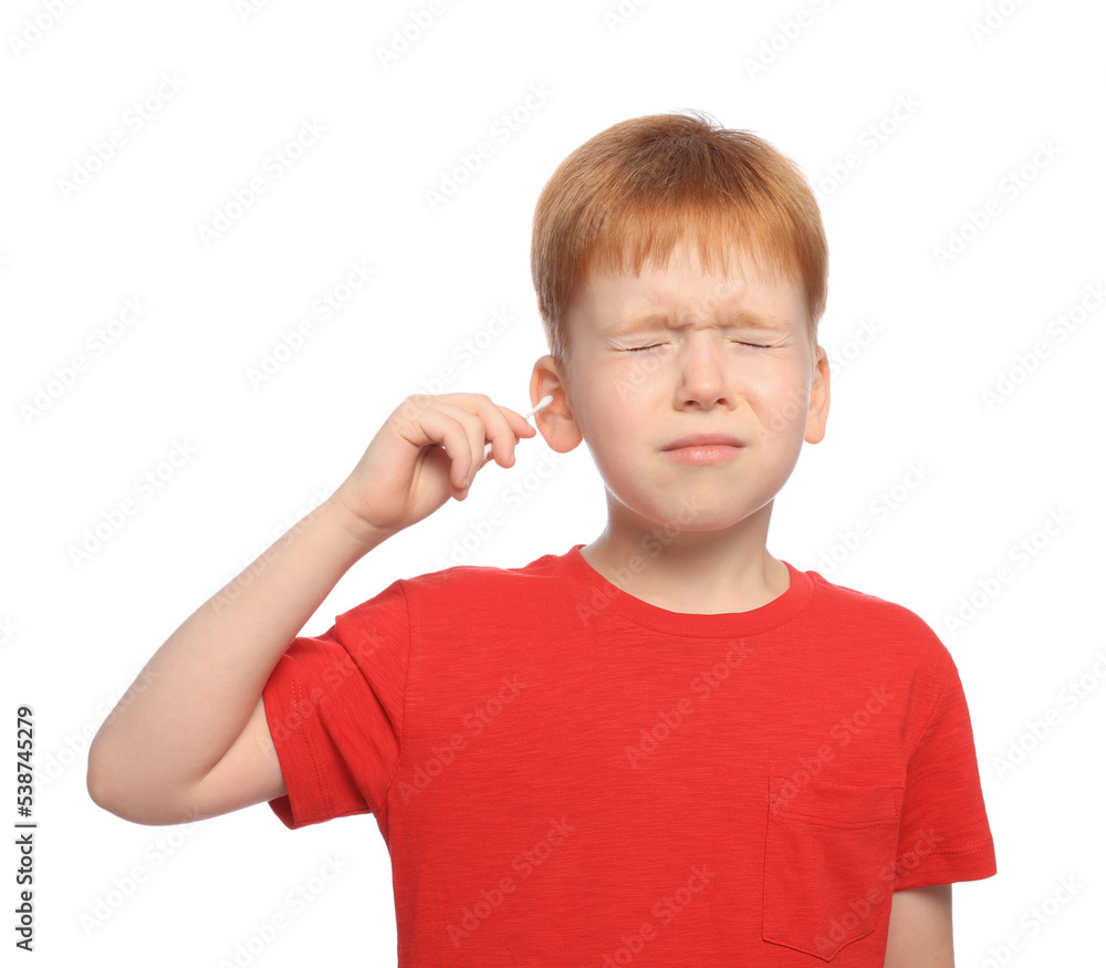 Little boy cleaning ear with cotton swab on white background Little boy cleaning ear with cotton swab on white background