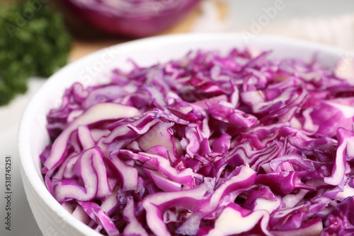Bowl with shredded red cabbage, closeup view
