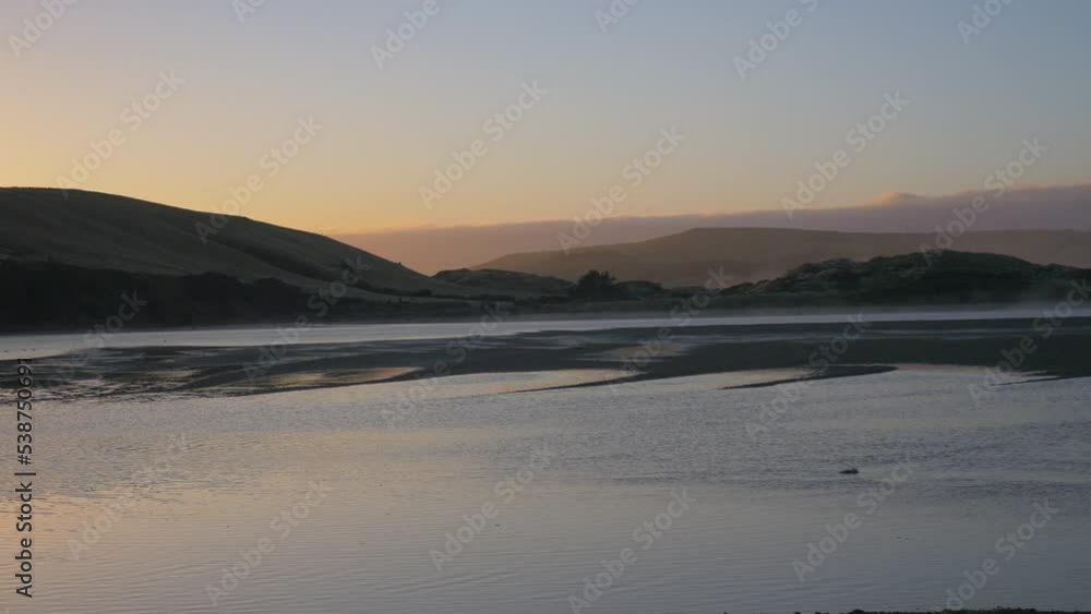 Early morning lake with mist, in New Zealand Early morning lake with mist, in New Zealand