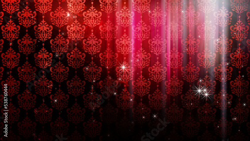 色のついた背景にキラキラが舞い、光が左右に動く