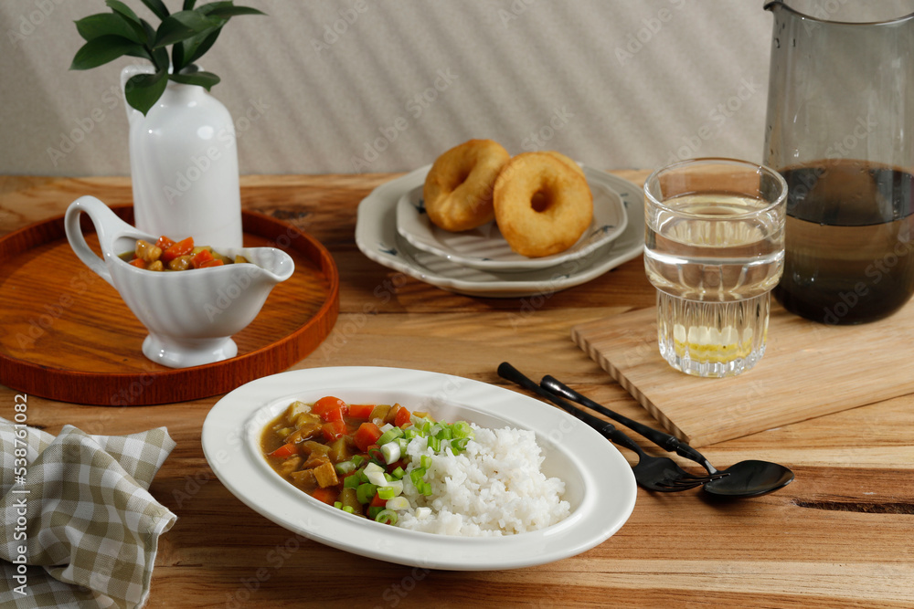 Breakfast with Japanese Curry, Rice, Lemon Water, and Donut Breakfast with Japanese Curry, Rice, Lemon Water, and Donut